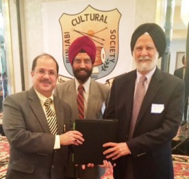 L to R_CG Dr Ausaf Sayeed_ Rajinder Singh Mago_ Dr Hardarshan Singh Valia_ presenting his published work to Dr Sayeed_(31) (22K)