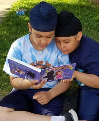 little kaur kids reading crop.jpg