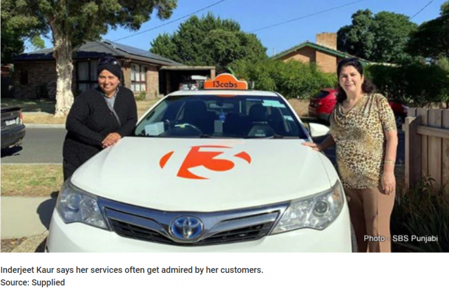 taxi kaur inderjeet with fan.png