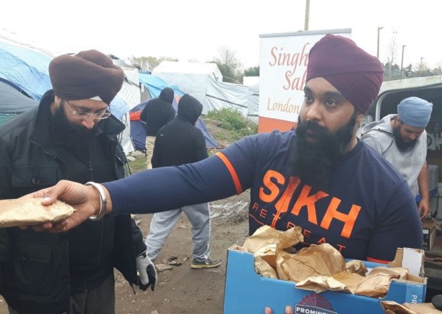 HandingOutFood (102K)