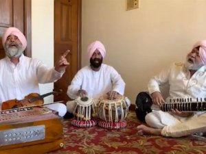 The Partap Brothers, a New York-based trio of Sikh musicians, use Facebook Live to broadcast their kirtan for Vaisakhi on Sunday, April 12, 2020. Video screengrab