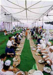 Enjoying the camp langar under the Big Top tent.