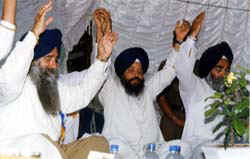 Sikhs doing a meditation at the camp