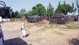 Although they may not look it, the luxury of running water showers complete with connected changing room tents was a welcome respite from the heat.