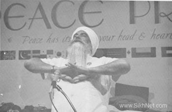 The Siri Singh Sahib demostrating a Mudra at Survival Camp