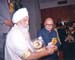 Siri Singh Sahib receiving Sikh Millenium Award from Shri LK Advani, Home Minister - Jan 2001