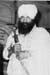 The Siri Singh Sahib holding a Siri Sahib
